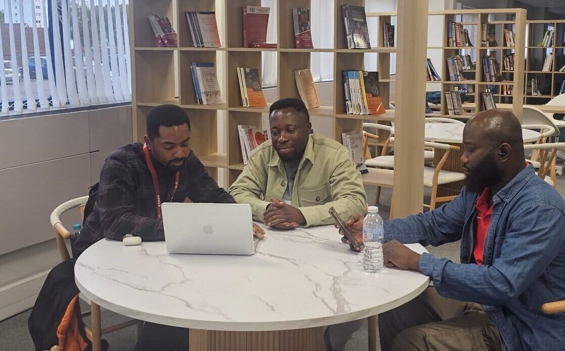 Students studying in the library and study spaces at Green Valley Academy